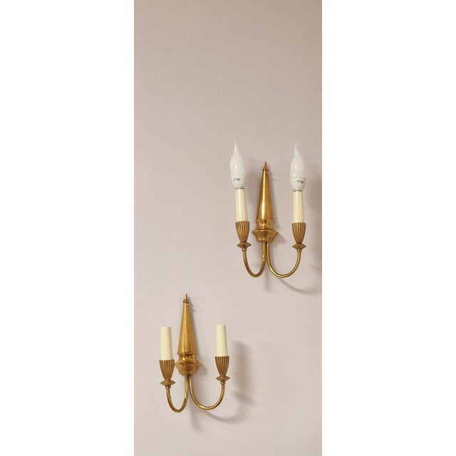 How many brass wall lights from the 1950s. Perfectly functional. European Plug (up to 250V).The wiring of this item may be...