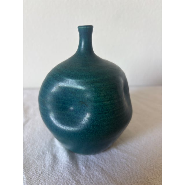 This stunning little vase is what decorative pottery is all about. The form is irresistibly tactile, inviting, balanced...