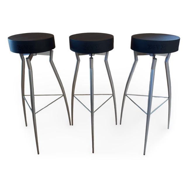 Set of three 1980s postmodern bar stools manufactured by Zeus Noto in Italy and designed by Claudio Nardi. The stools have...