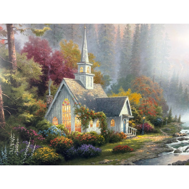 For your consideration, a stunning, professionally framed limited edition print of "The Forest Chapel" by Thomas Kinkade,...