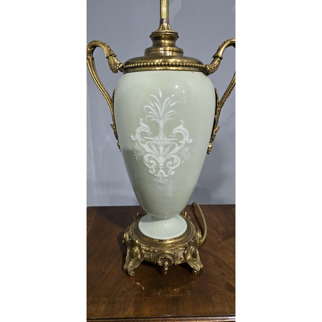 A large outstanding quality French pate-sur-pate table, top qualty ormolu mounts, in excellent overall condition. 20" high...