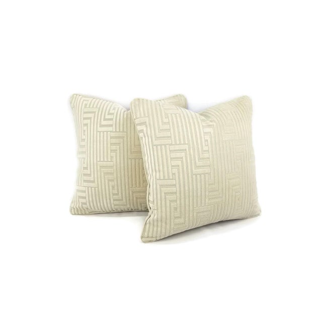 From Groundworks is Louvered in the color Beige. This pillow is backed with Pindler & Pindler Townsend in Papyrus. The...