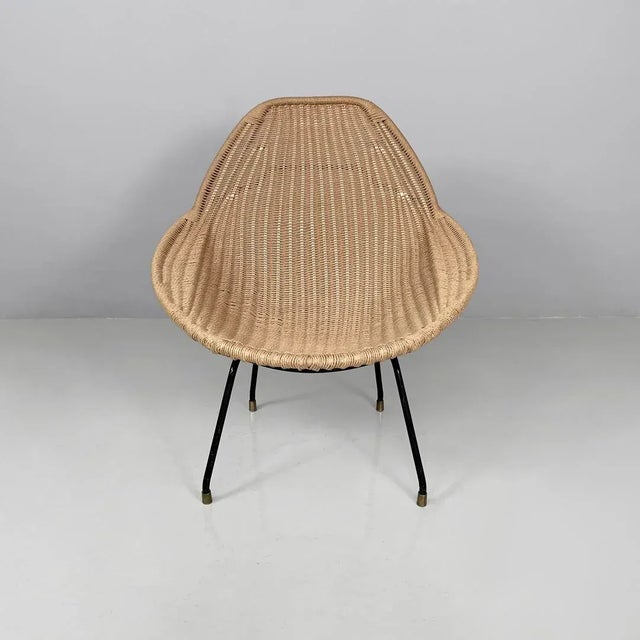 Italian mid-century modern armchair Du 50 by Gastone Rinaldi for Rima, 1950s Armchair model Du 50 in metal and straw. The...