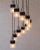 A cascading chandelier in the manner of Stilnovo made in Italy in the Seventies in perfect conditions. It works 110-240...
