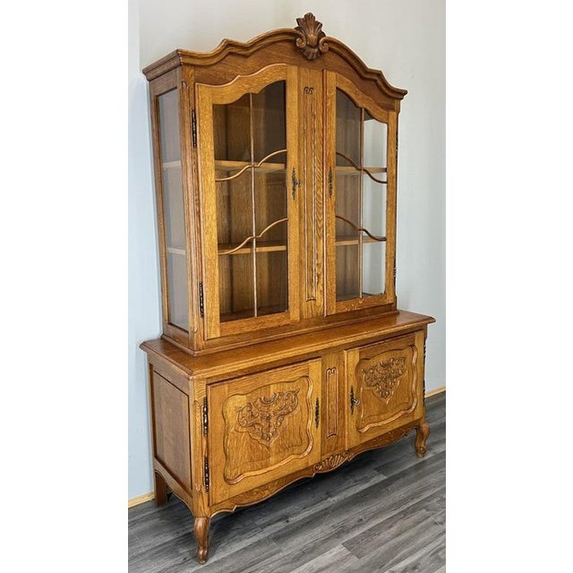 Elegant Vintage French Louis Oak Bookcase This refined Vintage French Louis oak bookcase showcases graceful proportions,...