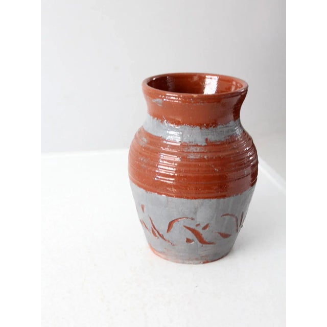 This is a vintage studio pottery vase dated 1979. Signed by the artist, the large handmade vase has a terra cotta and gray...