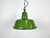 Industrial green enamel pendant light made by Zaos in Poland during the 1960s. White enamel inside the shade. Cast iron...