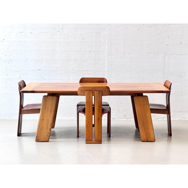 A rare and sculptural "sapporo" dining set consisting of a generously sized dining table and four matching dining chairs,...