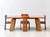 A rare and sculptural "sapporo" dining set consisting of a generously sized dining table and four matching dining chairs,...