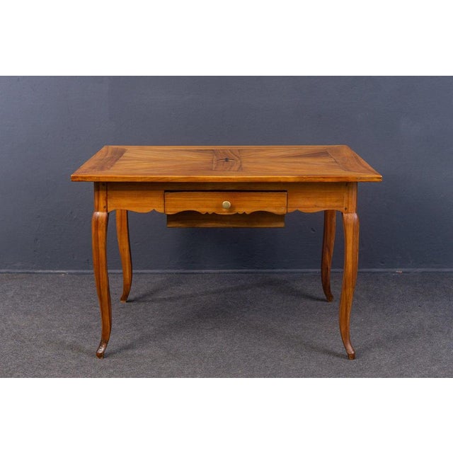 Table Epoch & Style: Biedermeier - 1st half of the 19th century Features - mostly made of solid cherry - table top also...