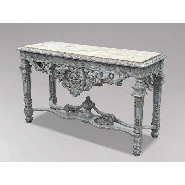 A very decorative french louis xiv style carved painted faux marble top hall console table a 20th century french louis xiv...
