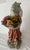Vintage Whimsical Folk Art Country and Fun Bunny Rabbit Statue Features a lovable bunny rabbit holding a basket standing...