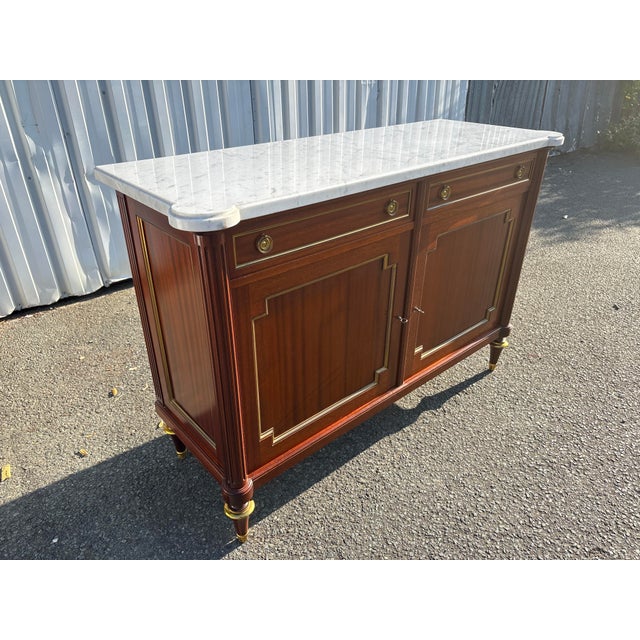 Elegant french neoclassical sideboard by maurice hirsch, stamped “m. Hirsch”. this beautifully proportioned piece is...