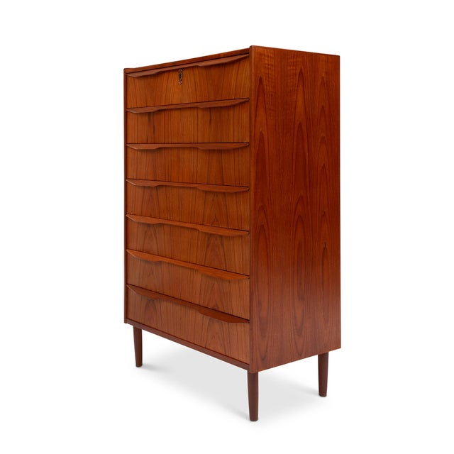 A refined example of Danish Mid-Century Modern design, this 1960s teak tallboy dresser beautifully balances form,...