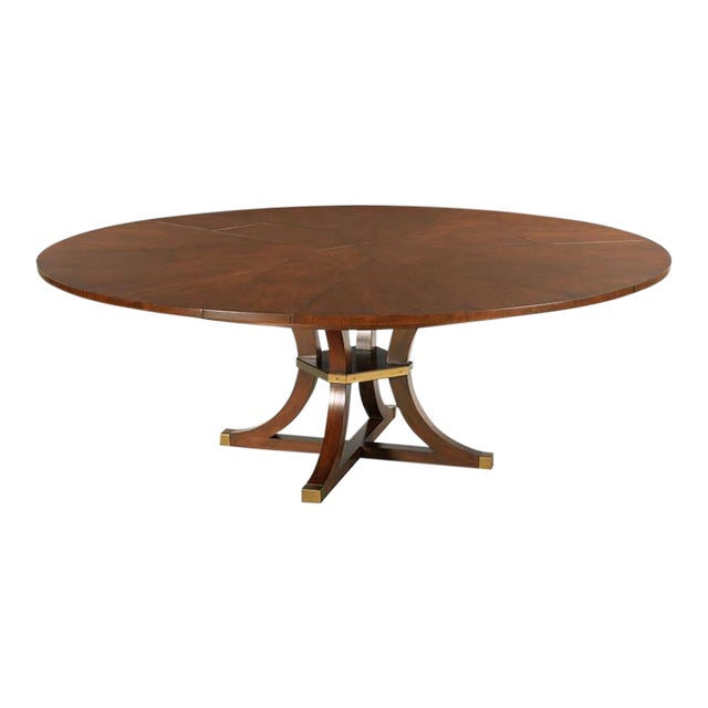 64–84-Inch Expandable Cherry Jupe Dining Table With Brass Stretcher and Brass-Capped Saber Legs For Sale