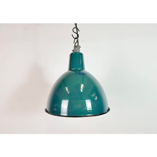 Industrial green enamel pendant light made by A23 factory in Wilkasy in Poland during the 1960s. White enamel inside the...