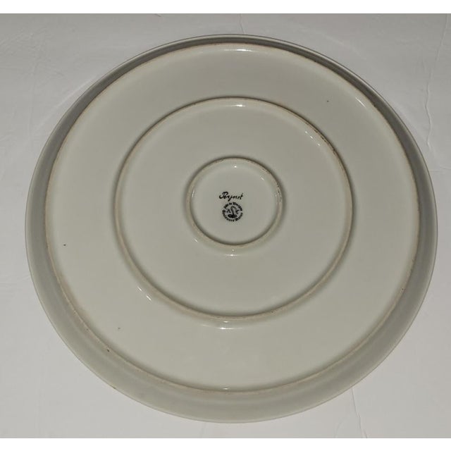 We recently came across this beautiful ceramic platter designed by the French Cartoonist Raymond Peynet, who died in Paris...