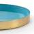Round tray crafted in aqua enamel with a polished gold exterior. Not for food use. For decoration only. Pairs best with...