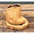 This vintage vessel takes on a naturalistic, boot-like silhouette, its rounded body rising asymmetrically before curving...