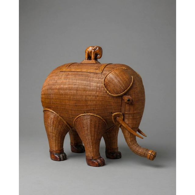 A true conversation piece — this vintage woven rattan elephant is equal parts sculptural charm and hidden storage....