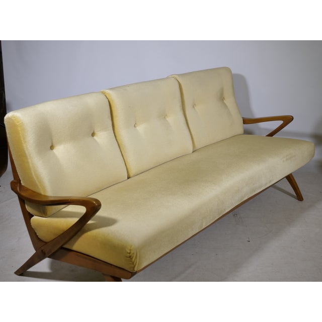 Vintage three-seater sofa by Guglielmo Ulrich (attributed to him), Italy, from the 1950s. Characteristic features include...