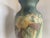 Antique Arts & Crafts art pottery Hudson Perfector vase by Weller Pottery features a pink and white floral design on...