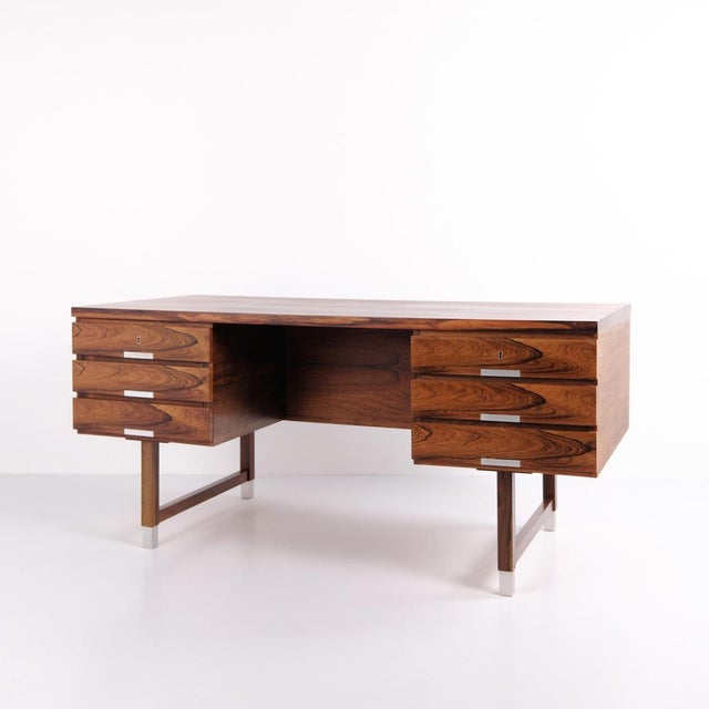 Midcentury desk model EP401 from Eigil Petersens Møbelfabrik, produced in the 1960s. Made in rosewood with six drawers and...