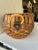 The vintage basket features rounded woven body. The basket is equipped with a rope handle attached by leather tabs and...
