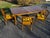 Mid Century wood table and 6 chairs Table has 2 leaves Looks to be in original condition I don’t see a stamp of who makes...