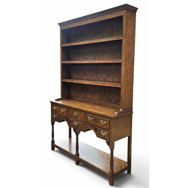 Brown Late 20th Century Baker Furniture Georgian-Style Carved Oak Welsh Dresser With Open Plate Rack [2-Part], Brass Bail Hardware and Turned Supports For Sale - Image 8 of 15