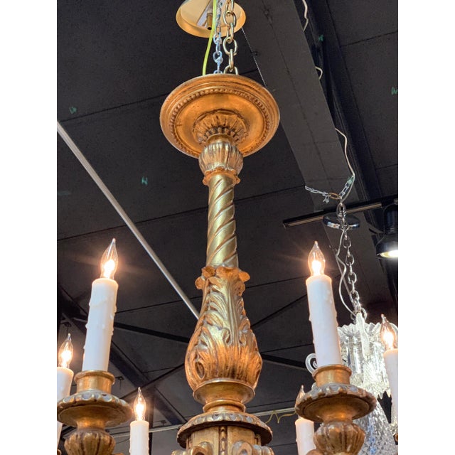 Very fine 19th century Italian and giltwood 12-light chandelier. Beautifully carved and high quality gilt finish. An...
