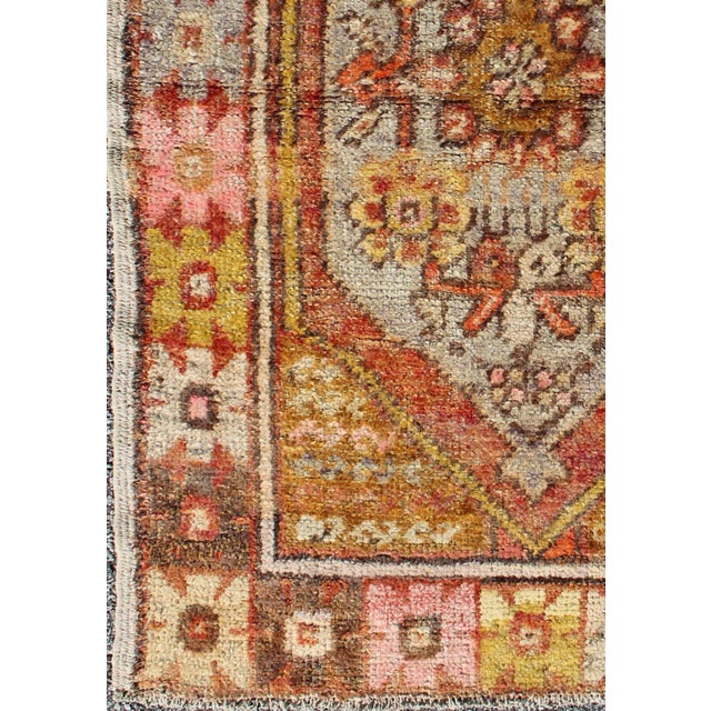 Turkish Colorful Vintage Turkish Small Oushak With Floral Medallion and Border For Sale - Image 3 of 7