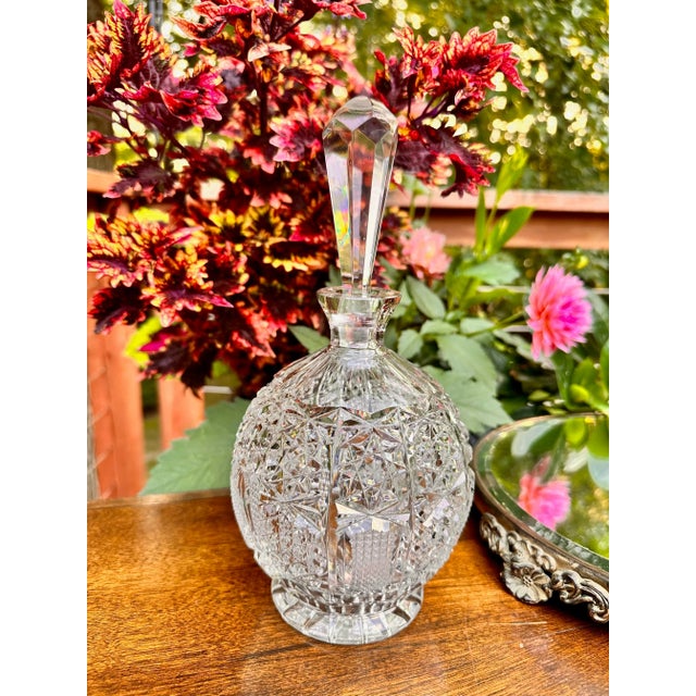 Round body Cut glass decanter with stopper. Czechoslovakia Early to mid 20th century Nice cut glass designs over the body...
