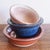 Set of 3 vintage stoneware pottery bowls. The orange bowl is signed on the base and dated ‘81. 8.25” width x 2.25” height...