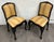 This is an elegant pair of vintage, possibly antique, French Louis XV Revival side chairs featuring shaped backs, carved...