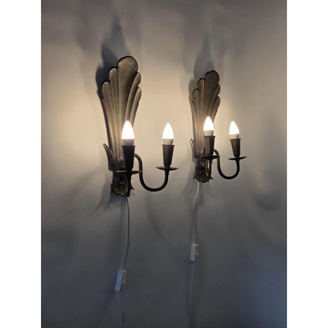 Pair of Wall Lamps Model 7004 designed by Paavo Tynell. The lamps are made of brass, and are in very good condition. I...