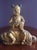 Wonderful Chinese carved wooden Quan Yin or Ancestor figurine sitting atop a foo dog. Very Zen and peaceful. There is a...