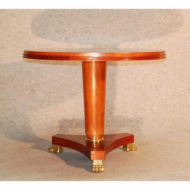 - 1940s pedestal table in mahogany and mahogany veneer - In the style of André Arbus - Slender leg and veneered top with...