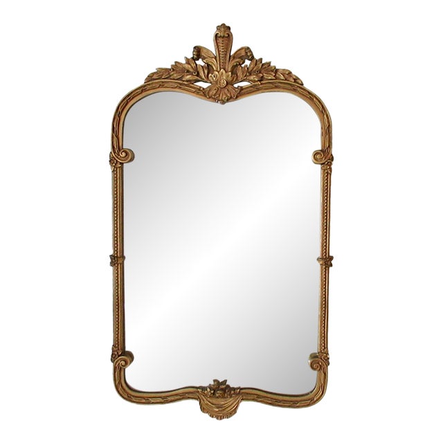 C. 1960's Hollywood Regency Era, French Rococo-Style Gold Gilded Fleur De Lis Wall Mirror For Sale