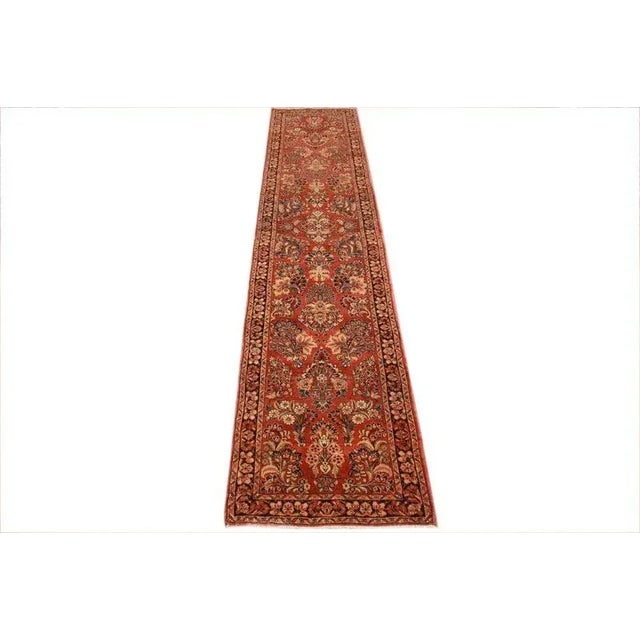 Antique rug Sarouk | Knot density: High, exact count not specified | Pattern: Colorful leaf and flower motifs | Size:...