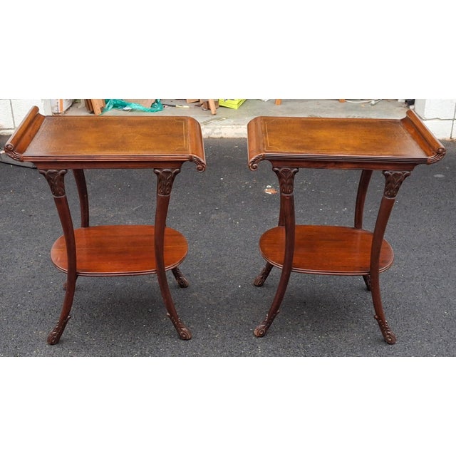 A Pair of Victorian Regency Style Carved Mahogany partial gilt and Tooled Leather Inset Tiered Side Tables, Circa 1880s...