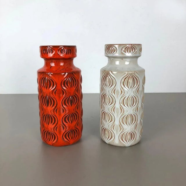 Article: Set of two fat lava art vases Model: Onion Producer: Scheurich, Germany Decade: 1970s These original vintage...