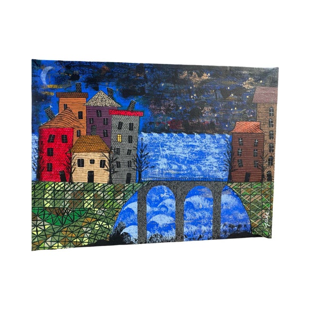 An original mixed media art piece titled “Night Watch” depicted whimsical historical buildings, a bridge and body of water...