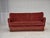 1970s, 3-seater Danish curved sofa. Original pink furniture velour, brass springs in the, beech wood legs with brass...