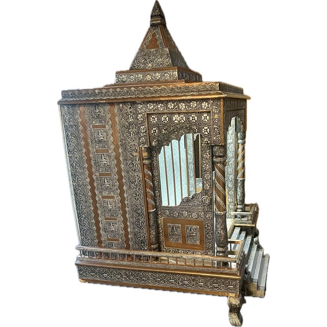 Authentic, handmade vintage Indian mandir crafted from carved wood with ornate silver- and brass-tone metal detailing...