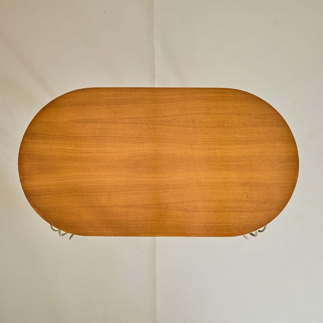 A 1940s French console table, in the manner of René Prou, a key figure in early 20th-century French decorative arts. The...