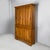 Italian Art Nouveau sideboard in wood, 1920s Rectangular wooden sideboard with two sections. The upper section has three...