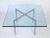 Vintage high-quality reproduction of the iconic Knoll Barcelona coffee table in a rare smaller size of 30" square instead...