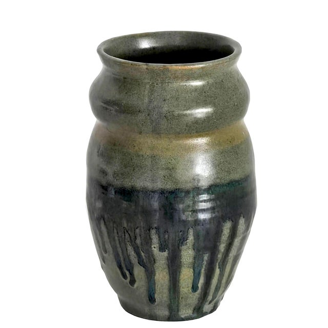 Offered is a vintage studio pottery drip-glazed stoneware vase. It bears an illegible maker's mark and "85" on the bottom....