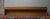 Danish long teak floating sideboard / shelf dating from about 1960, finely-shaped teak casing enclosing shelf, with two...